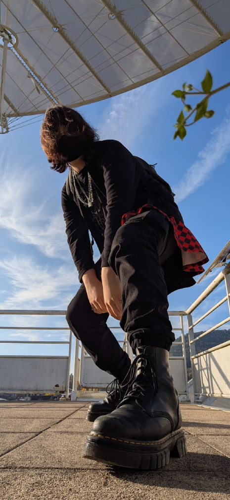 Picture of demdem on a rooftop, slaying like always